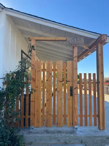 a view of a porch with a back yard