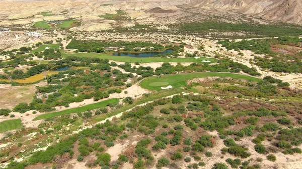 a view of city with green space