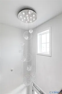 a bathroom with a granite countertop sink toilet and a mirror