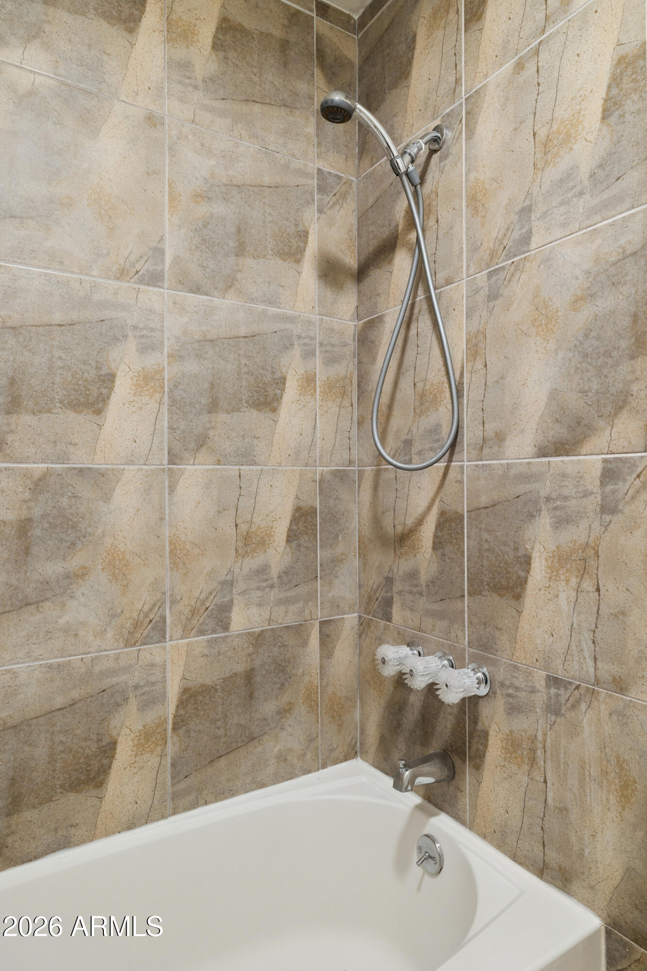 4343 East Osborn Road Phoenix, AZ 85018 - Photo 15 of 41 a bathroom with a bathtub