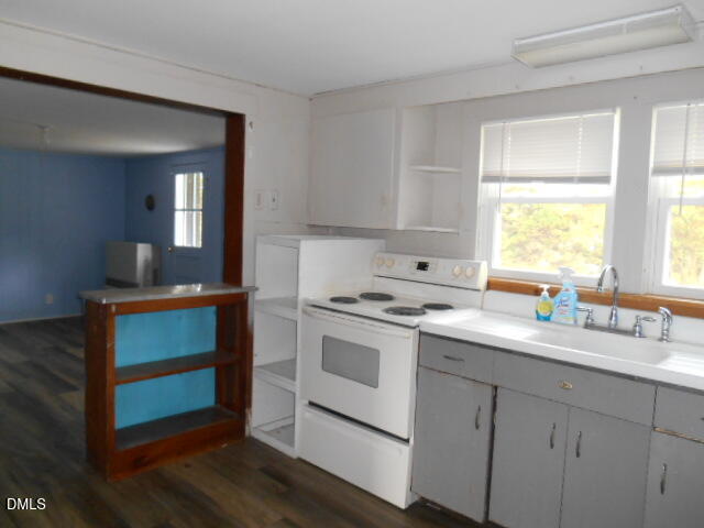130 Holland Road Angier, NC 27501 - Photo 14 of 22 a kitchen with a sink cabinets and window