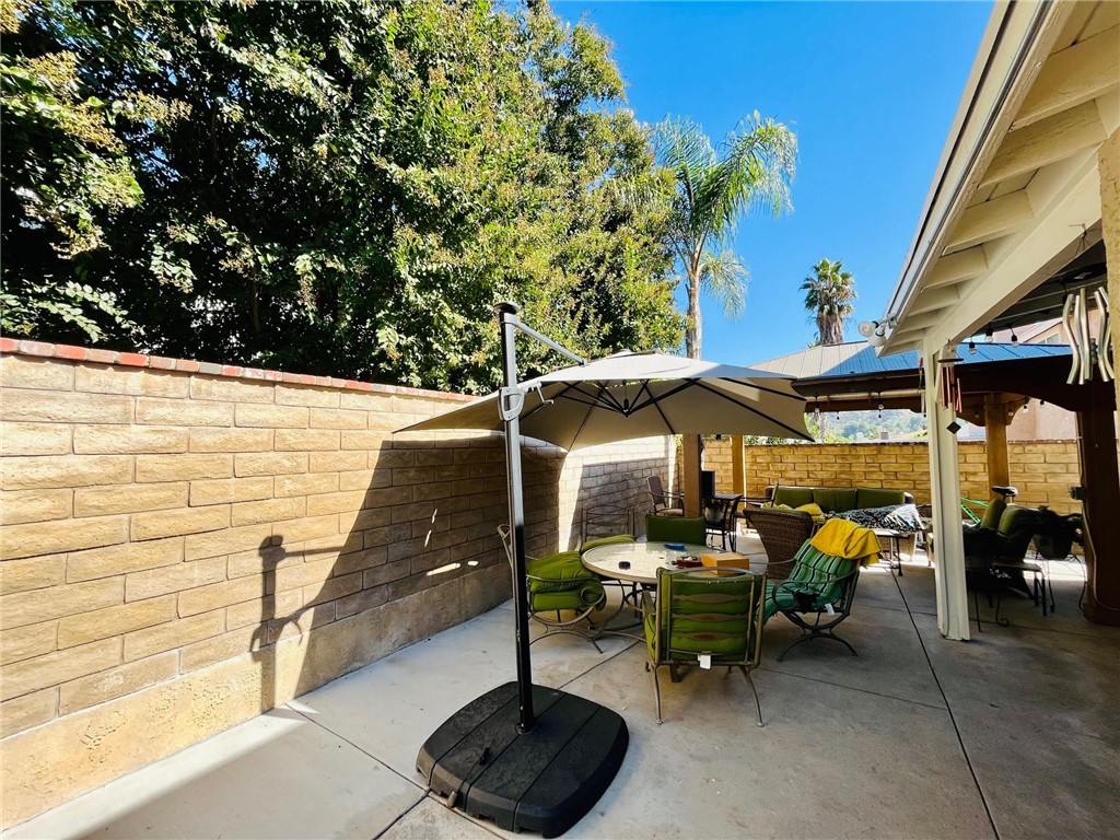 21945 Centurion Way Saugus, CA 91350 - Photo 20 of 25 a backyard of a house with outdoor seating