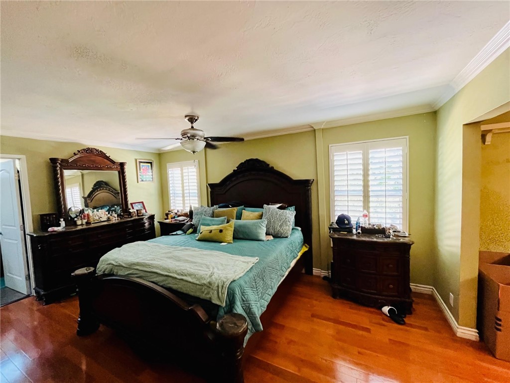 21945 Centurion Way Saugus, CA 91350 - Photo 9 of 25 a bedroom with a bed dresser and a window