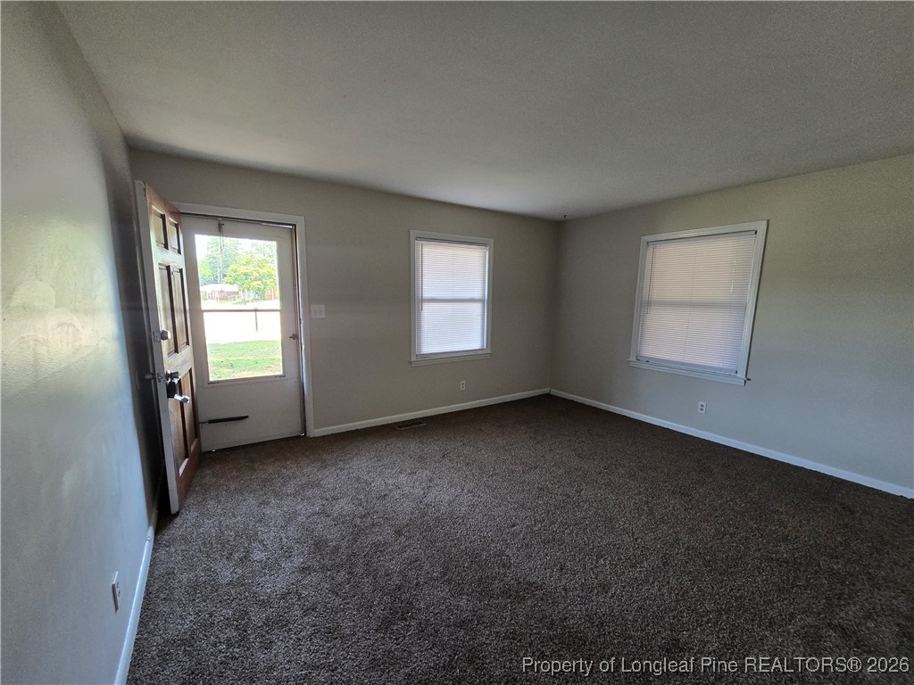 4617 Belford Road Fayetteville, NC 28314 - Photo 18 of 21 a view of empty room with windows
