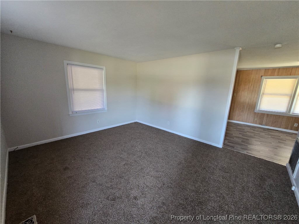 4617 Belford Road Fayetteville, NC 28314 - Photo 3 of 21 an empty room with windows
