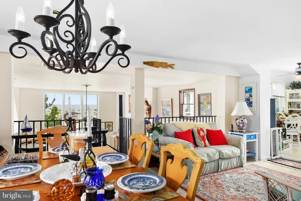 a view of a livingroom with furniture and furniture