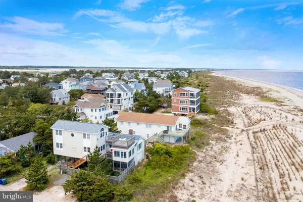 an aerial view of a house with a garden