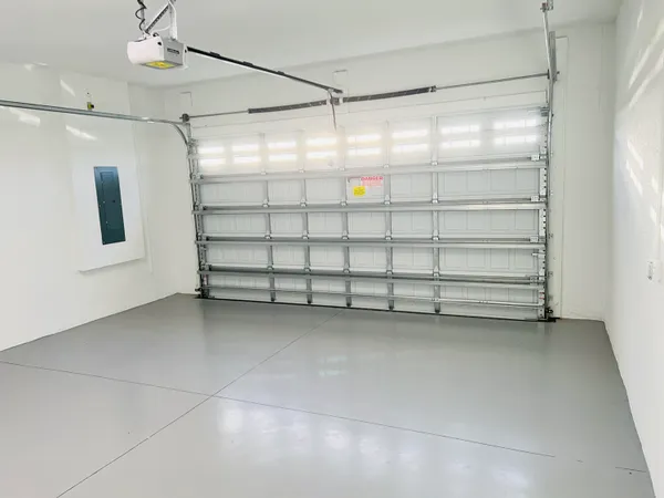 a view of a room with storage and racks on the wall