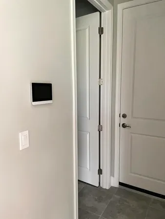 a view of a livingroom from a hallway