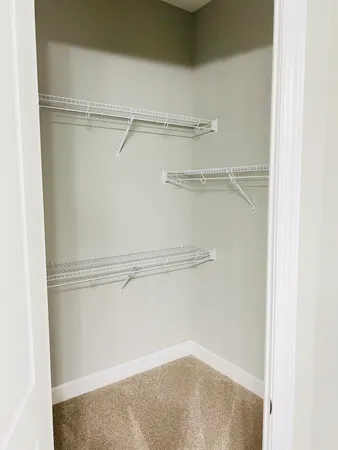 a view of a room with racks on the wall