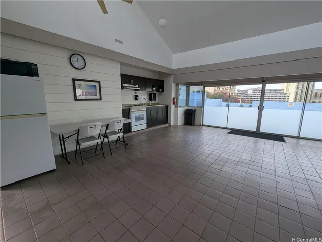 a view of a livingroom with furniture nad wooden floor