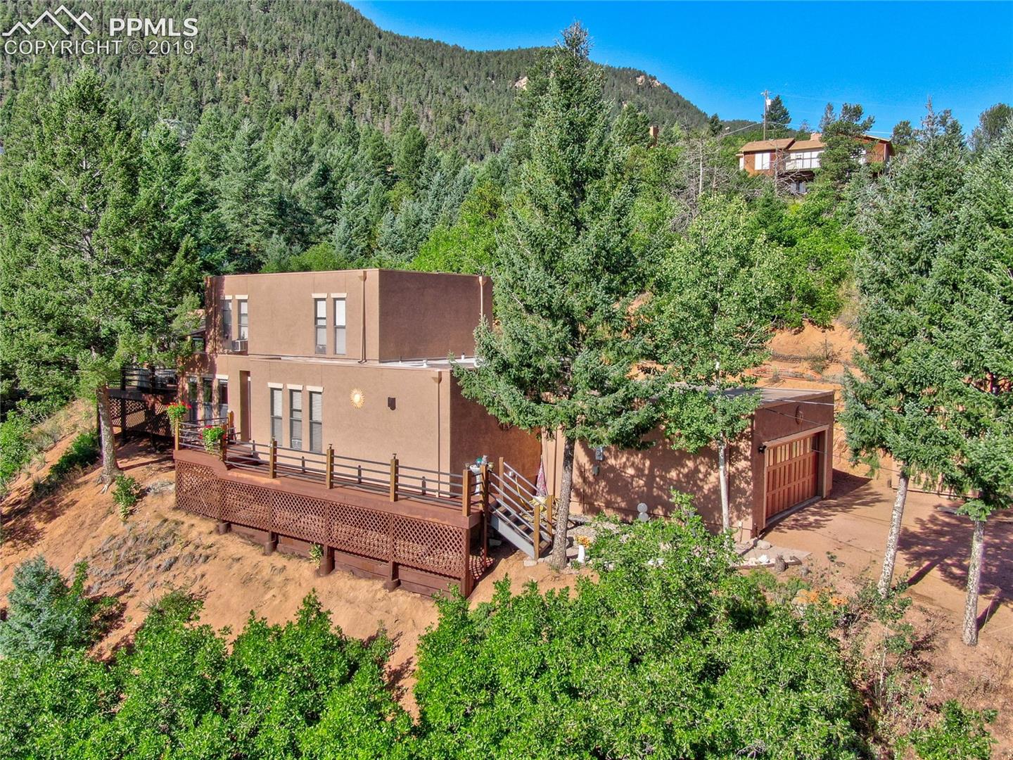 8725 Ute Road Cascade, CO 80809 - Photo 1 of 35 One of a kind beauty!