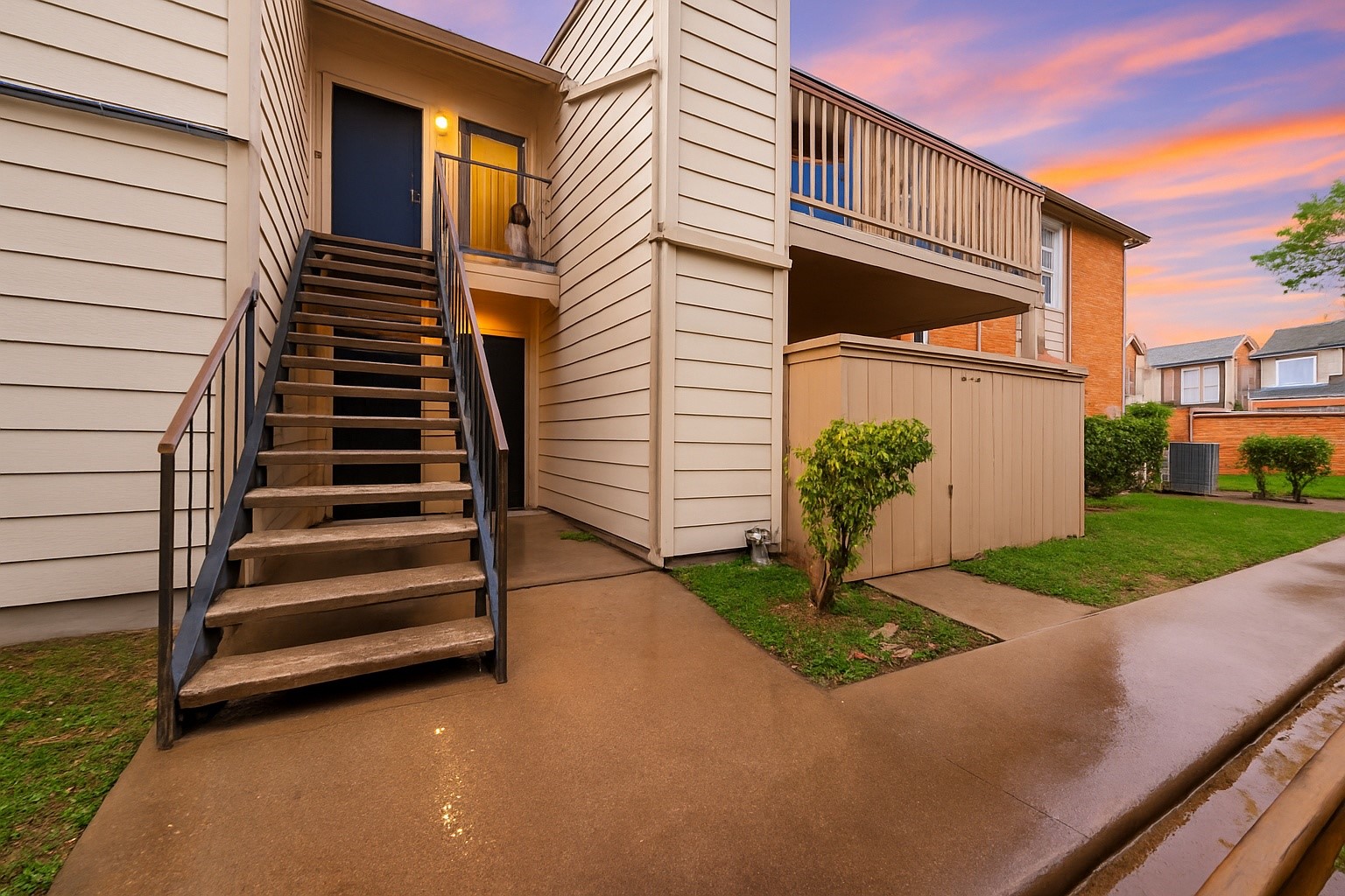 6001 Reims Road, Unit 908 Houston, TX 77036 - Photo 3 of 31 a front view of a house with a yard