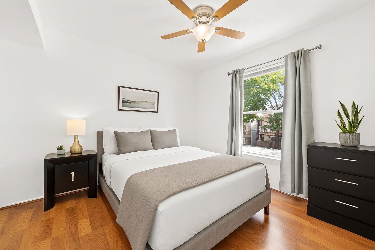 6001 Reims Road, Unit 908 Houston, TX 77036 - Photo 4 of 31 a bedroom with a bed and a window