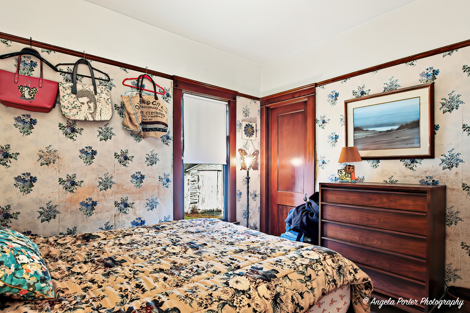 9712 St Albans Street Hebron, IL 60034 - Photo 17 of 28 a bedroom with a bed and a flat screen tv in it