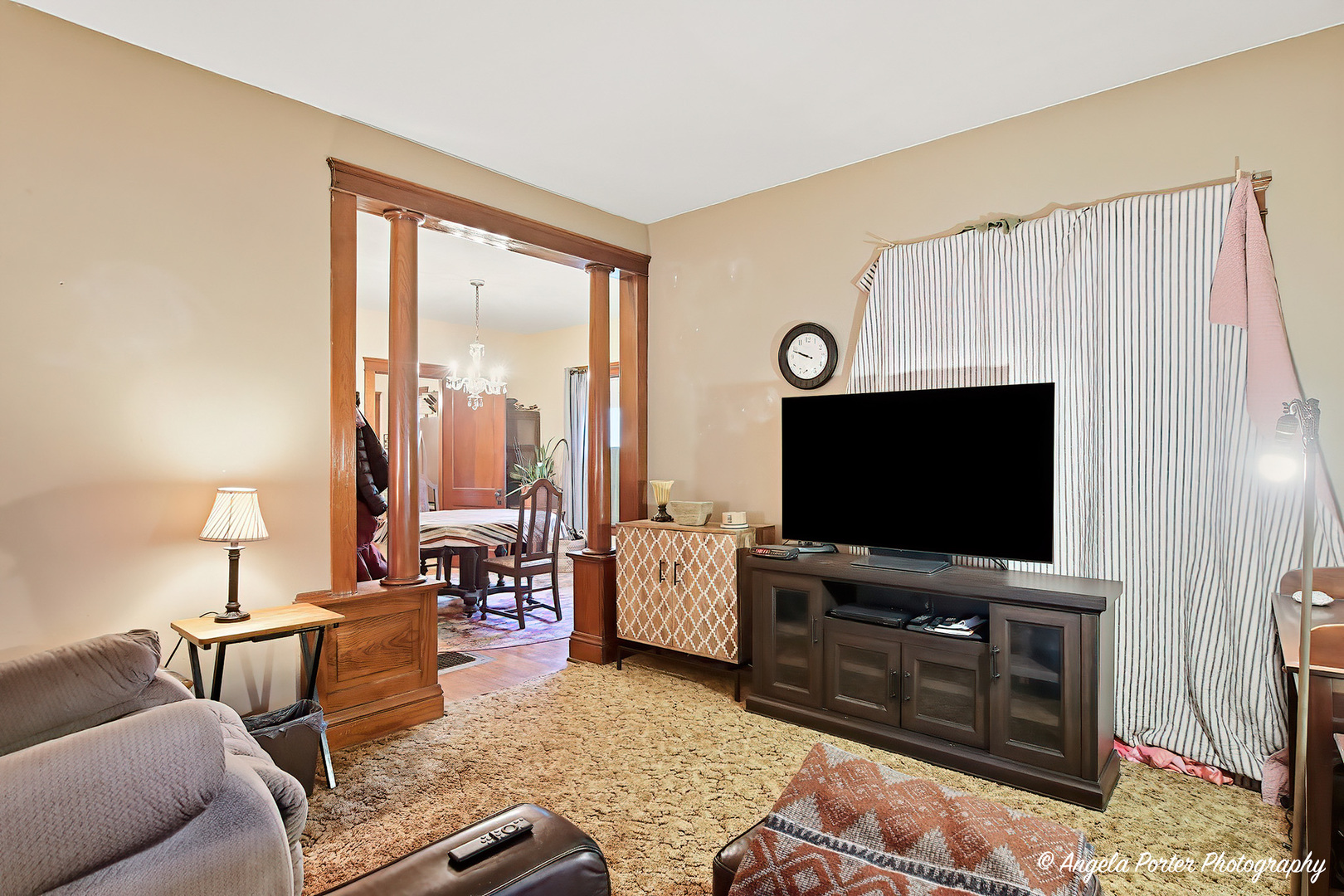 9712 St Albans Street Hebron, IL 60034 - Photo 5 of 28 a living room with furniture and a flat screen tv
