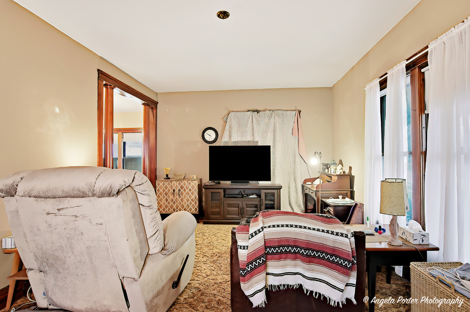 9712 St Albans Street Hebron, IL 60034 - Photo 6 of 28 a living room with furniture and a flat screen tv