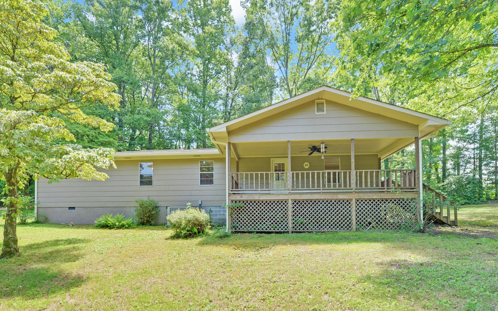 front view of a house with a yard