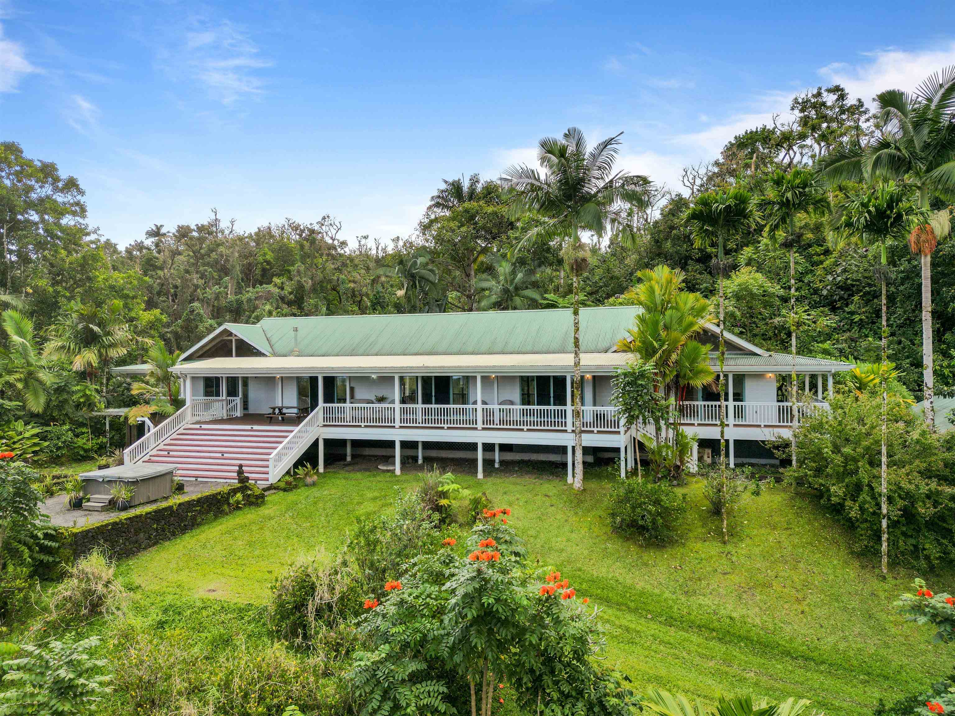 aerial view of a house with a garden