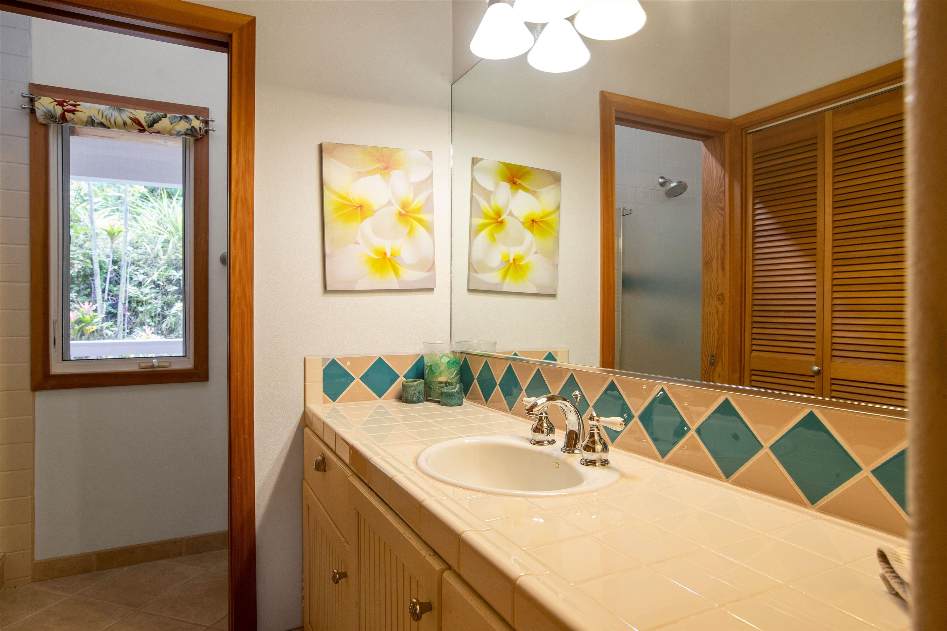 285 Kalo Road Hana, HI 96713 - Photo 21 of 36 a bathroom with a sink and a mirror