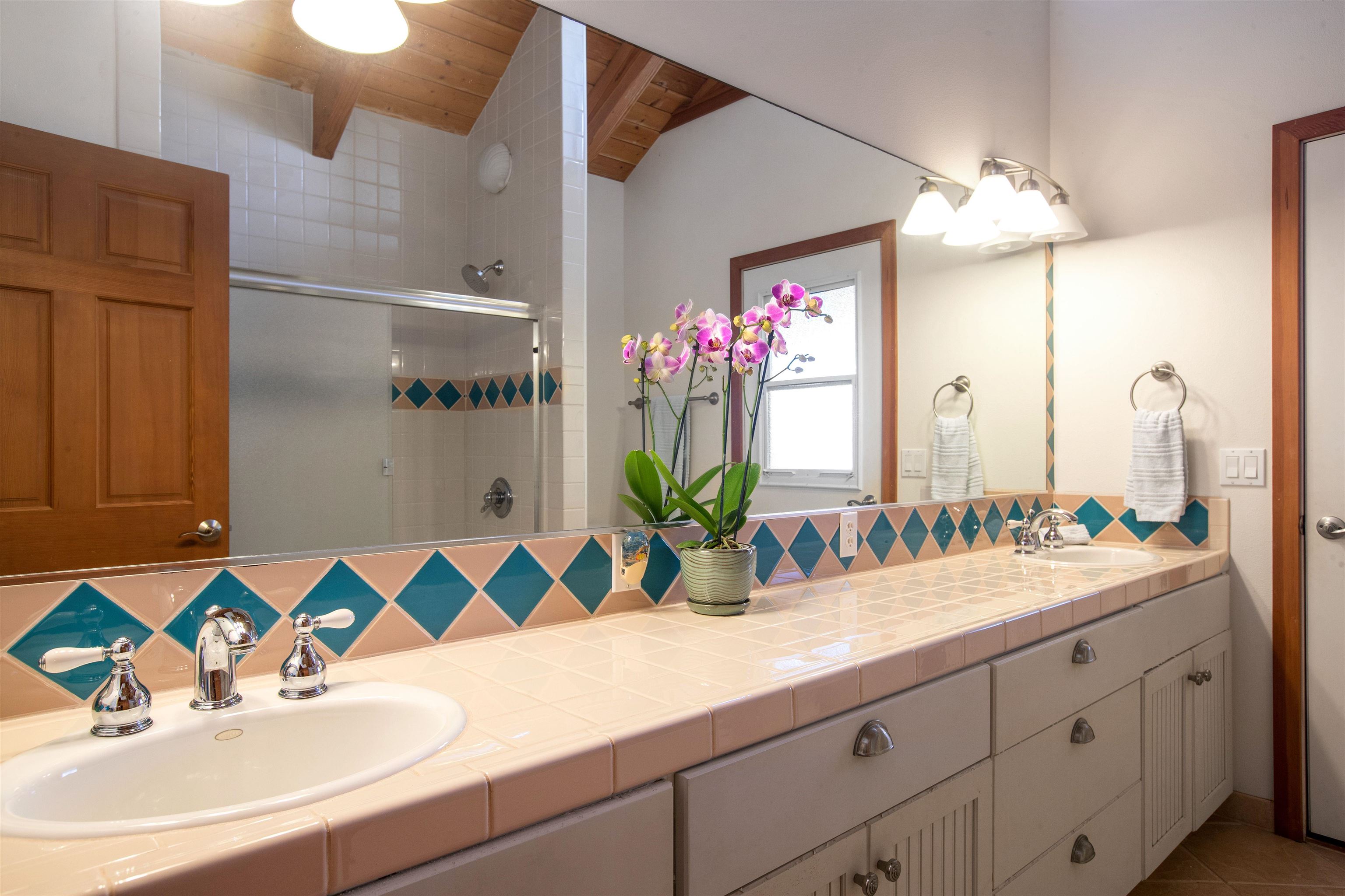285 Kalo Road Hana, HI 96713 - Photo 23 of 36 a bathroom with a sink and a mirror