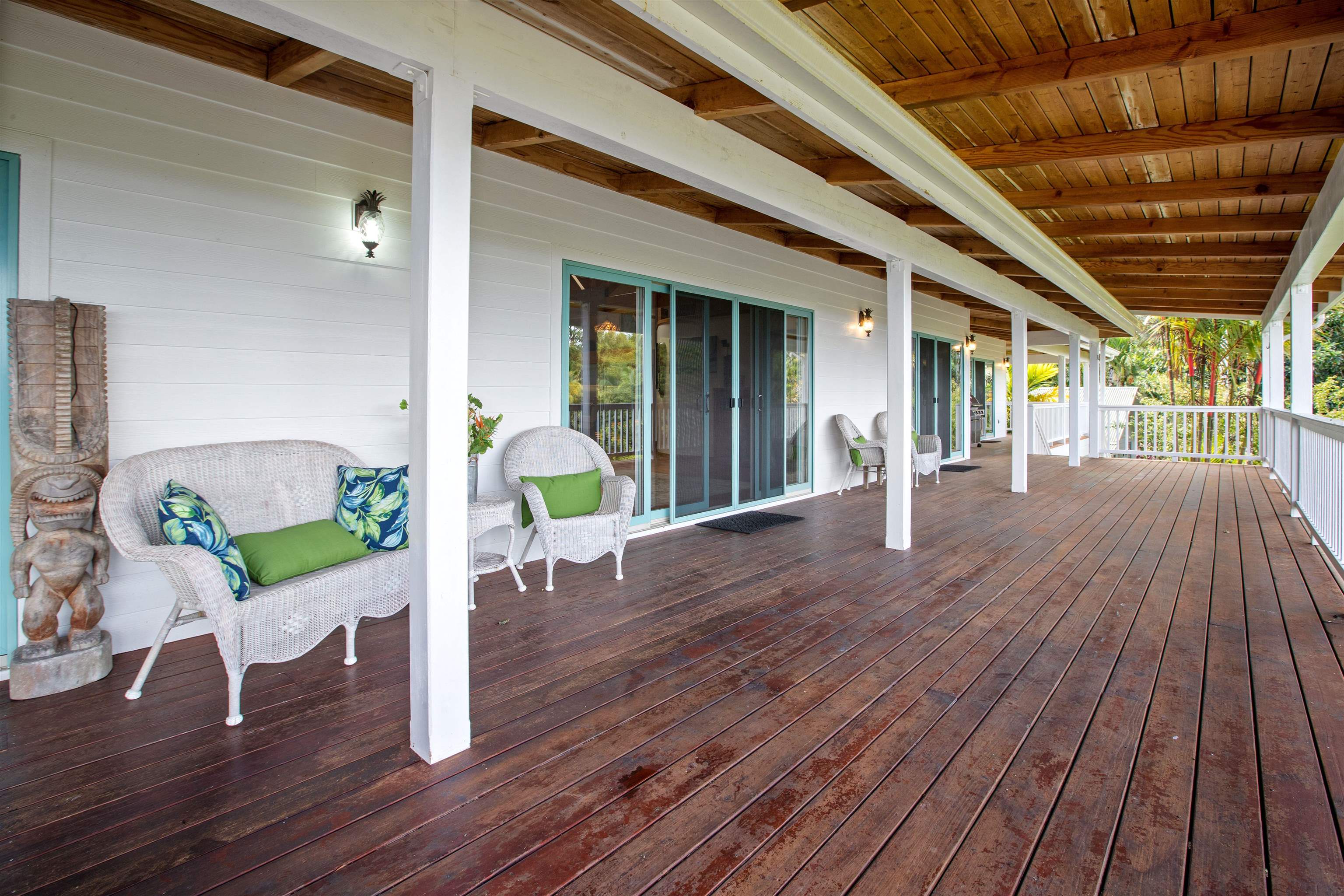 285 Kalo Road Hana, HI 96713 - Photo 25 of 36 a view of a house with a patio door and wooden floor
