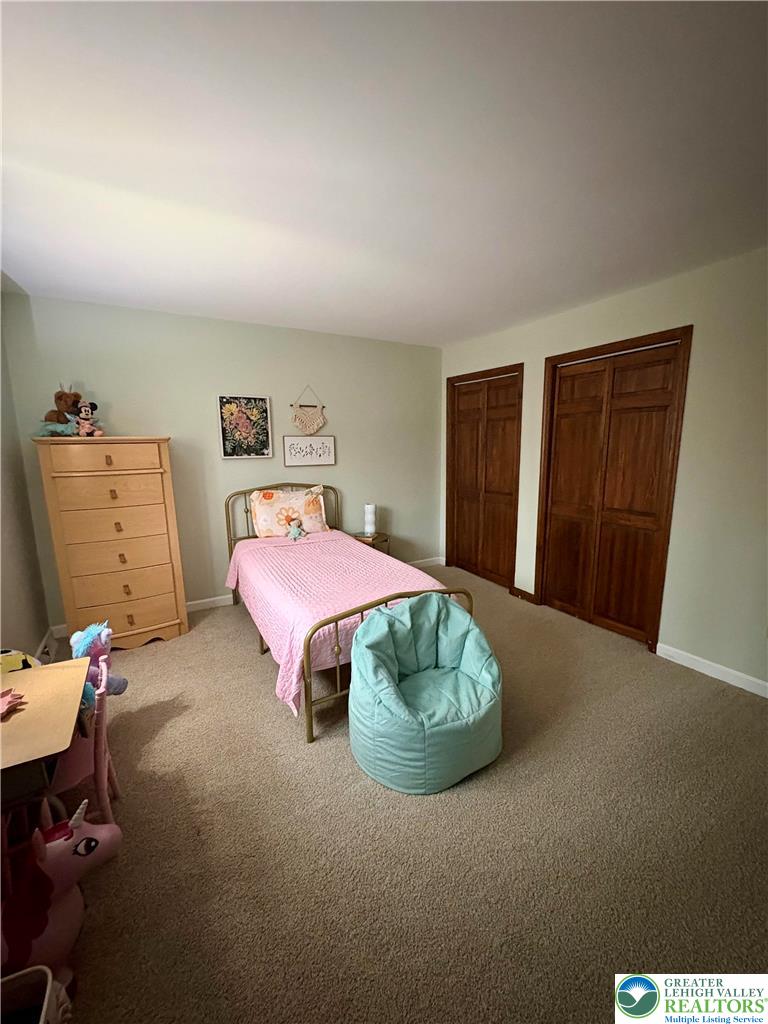 375 Georgetown Road Nazareth, PA 18064 - Photo 17 of 21 a bedroom with a bed and a mirror