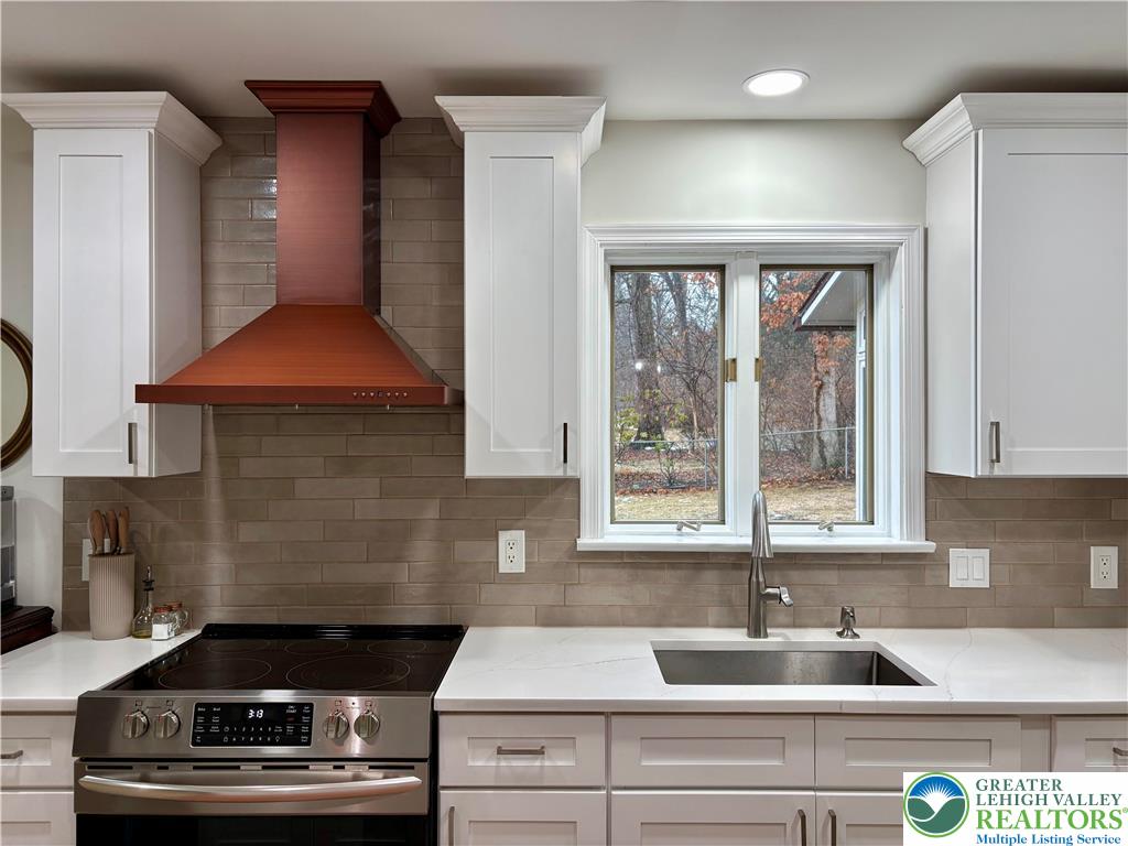 375 Georgetown Road Nazareth, PA 18064 - Photo 6 of 21 a kitchen with a stove and a window