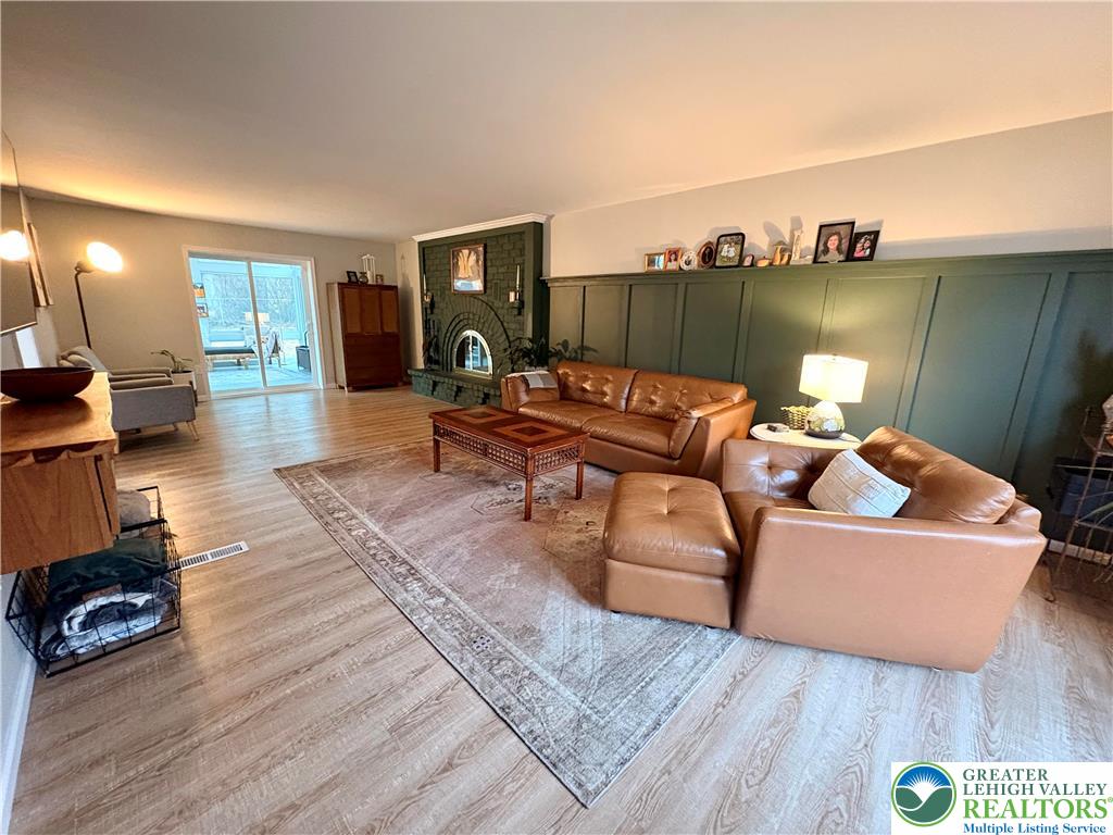 375 Georgetown Road Nazareth, PA 18064 - Photo 9 of 21 a living room with furniture and a wooden floor