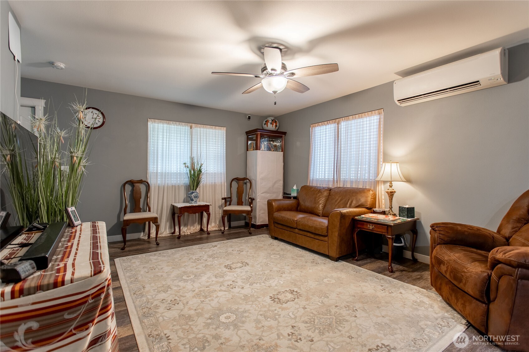 2915 Jackson Highway, Unit D Chehalis, WA 98532 - Photo 5 of 24 a living room with furniture and a flat screen tv
