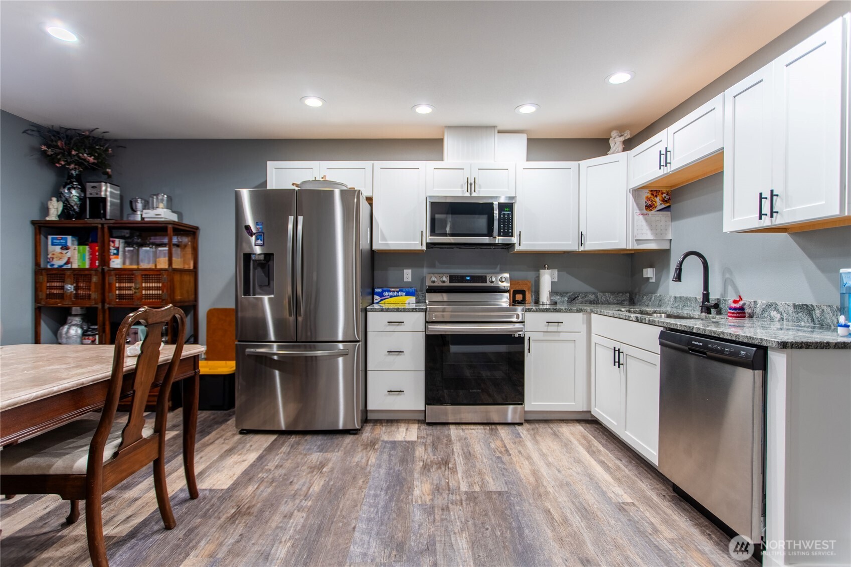 2915 Jackson Highway, Unit D Chehalis, WA 98532 - Photo 7 of 24 a kitchen with stainless steel appliances a refrigerator stove microwave and sink
