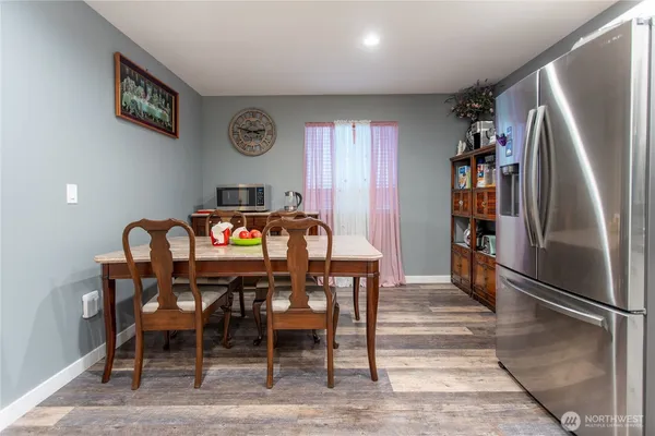 a view of a dining room with furniture