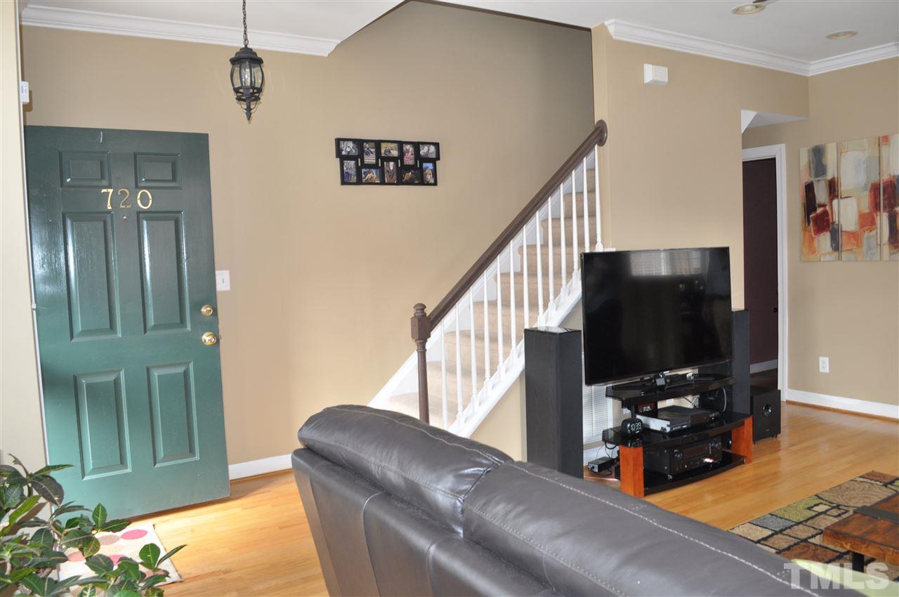 720 Parkham Lane Raleigh, NC 27603 - Photo 11 of 23 a living room with furniture and a flat screen tv
