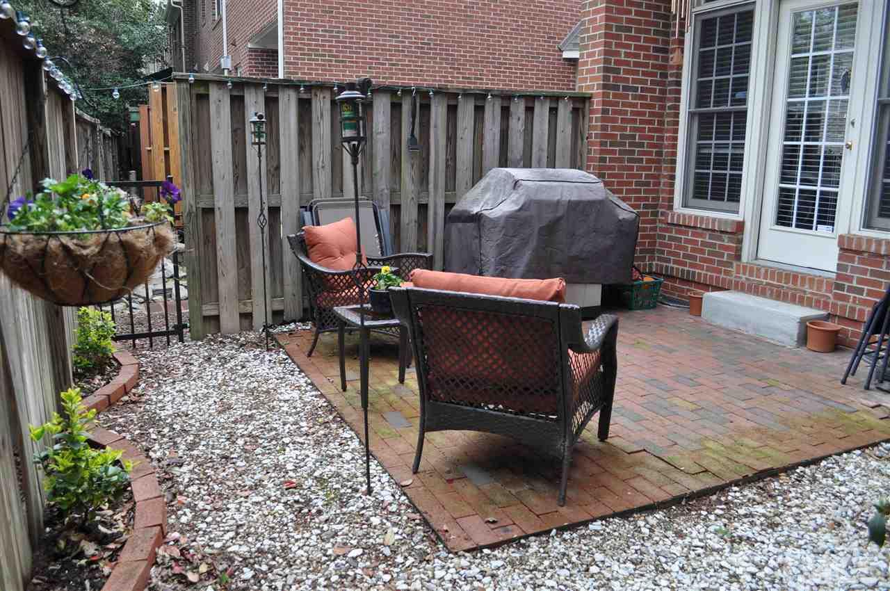 720 Parkham Lane Raleigh, NC 27603 - Photo 21 of 23 a view of a chairs and tables in the patio