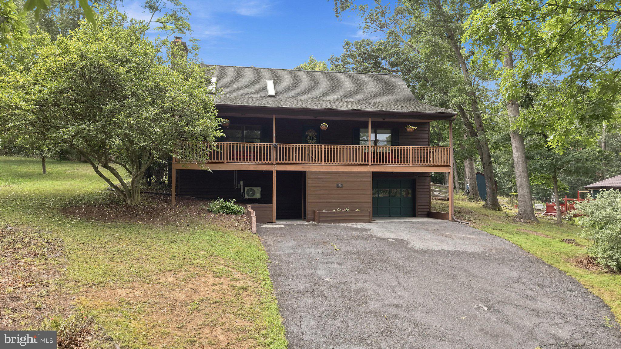 150 Holiday Road Cross Junction, VA 22625 - Photo 2 of 97 Expansive covered deck to relax & unwind