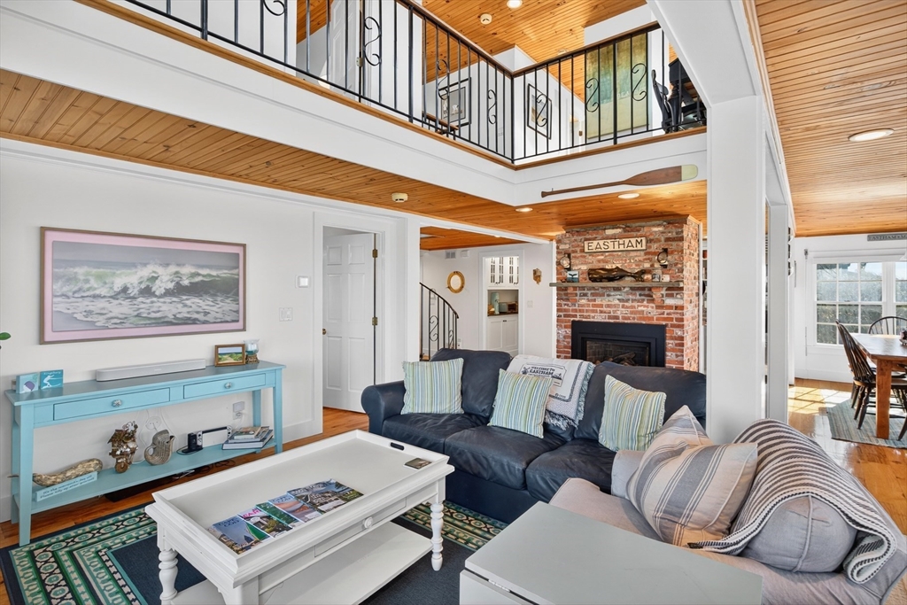 1145 Kingsbury Beach Road Eastham, MA 02642 - Photo 12 of 42 a living room with furniture
