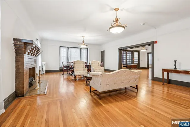 a view of a dining room with furniture and window