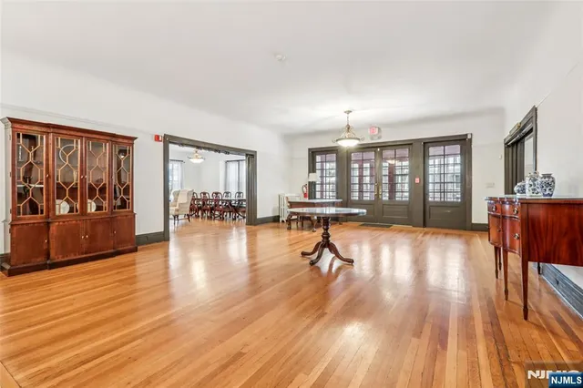 a view of a living room and dining room