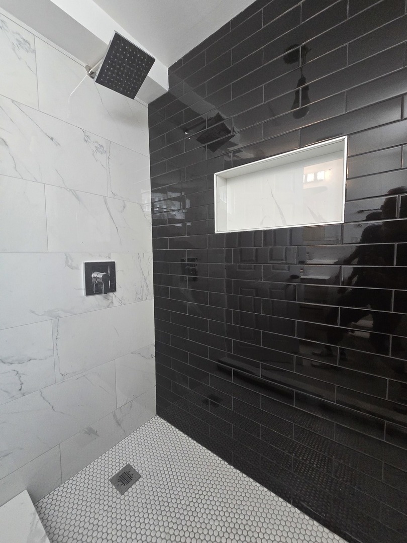 9727 South Michigan Avenue Chicago, IL 60628 - Photo 16 of 24 a bathroom with a shower