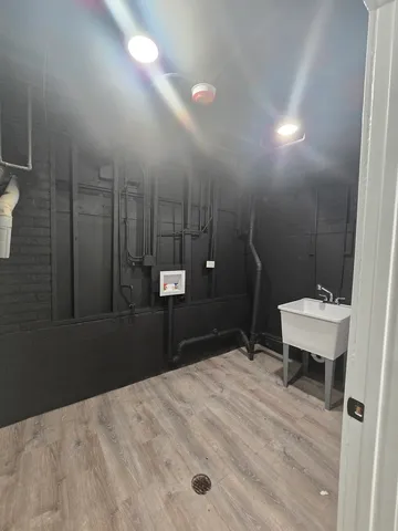 a bathroom with a sink and mirror
