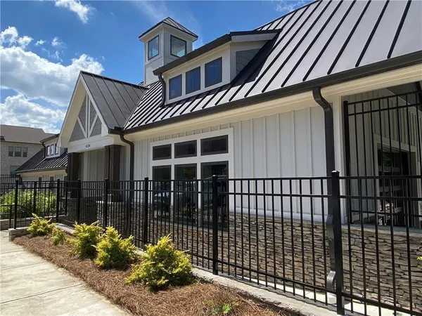 a front view of a house with a balcony