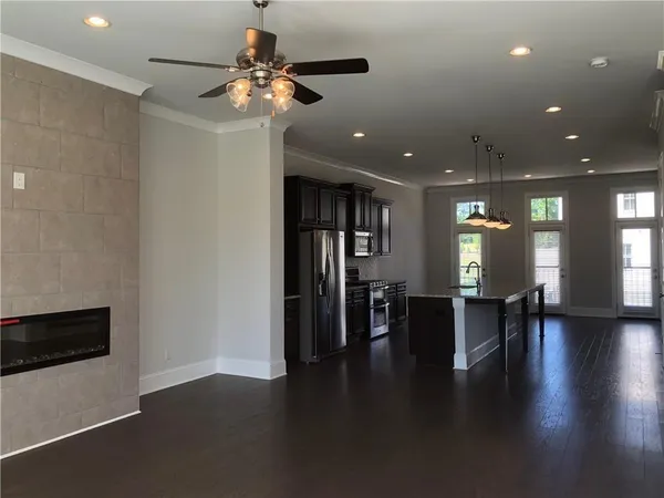 a lobby with furniture and wooden floor