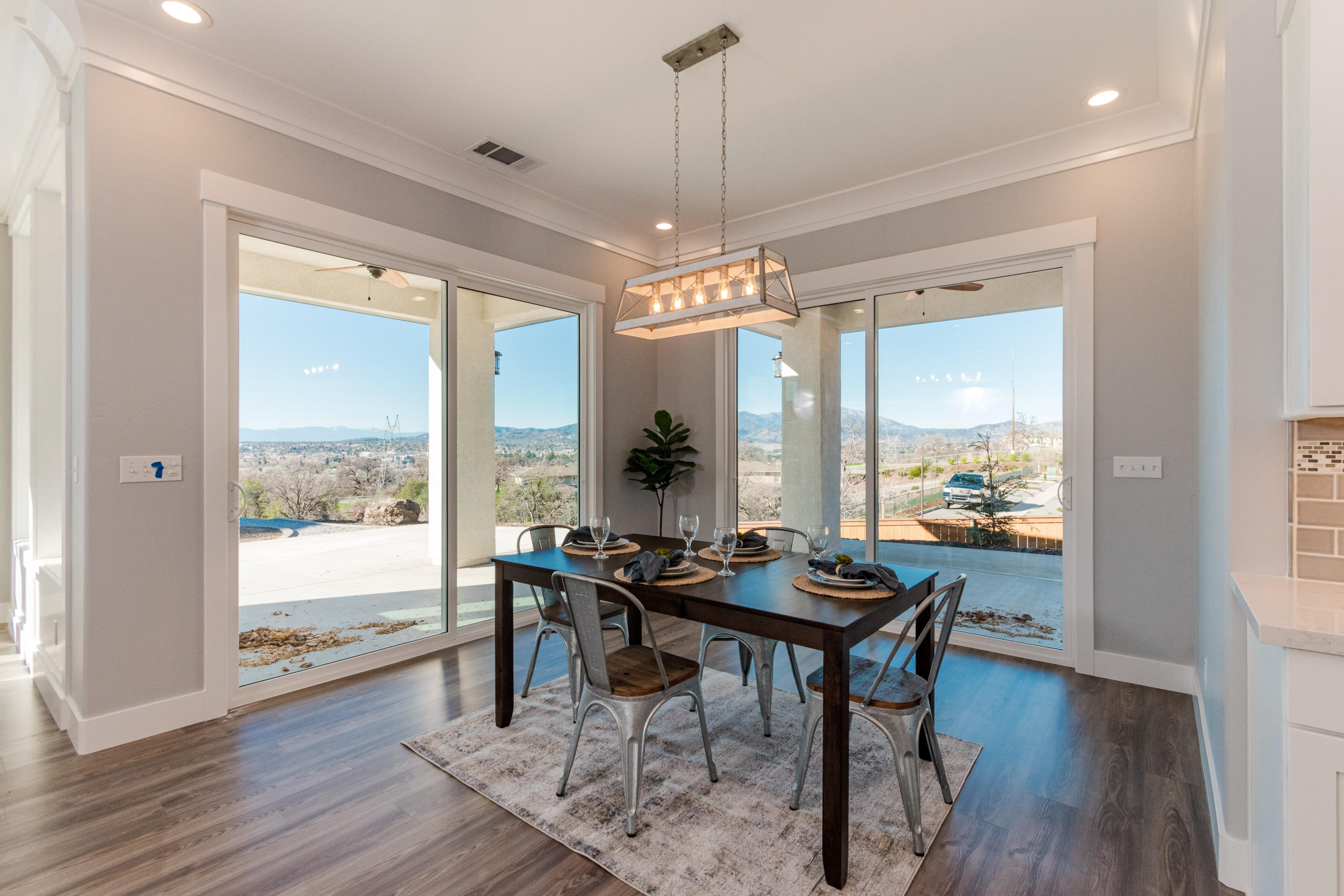 808 River Bend Road Redding, CA 96003 - Photo 12 of 43 a view of a dining room with furniture window and wooden floor