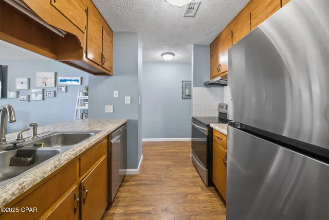 $239,999 | 6903 North Lagoon Drive, Unit 38, Panama City Beach, FL 32408