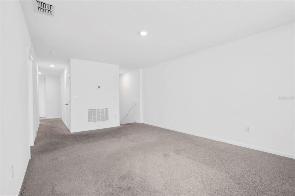 1038 Kelly Fern Loop Ruskin, FL 33570 - Photo 17 of 34 a view of an empty room