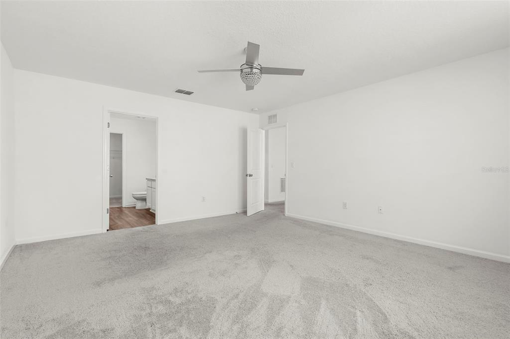 1038 Kelly Fern Loop Ruskin, FL 33570 - Photo 19 of 34 a view of an empty room