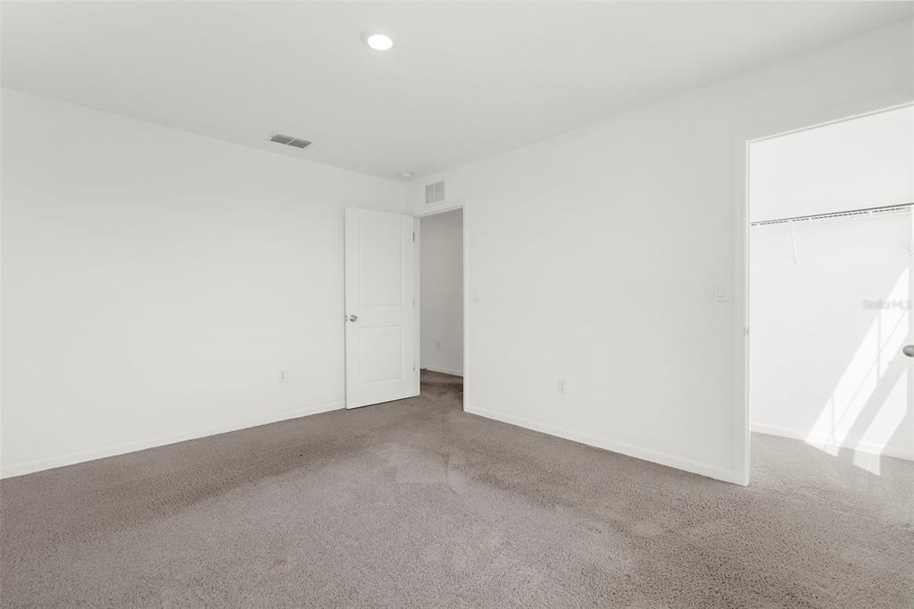 1038 Kelly Fern Loop Ruskin, FL 33570 - Photo 25 of 34 a view of empty room