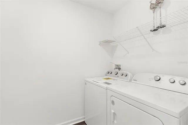 a view of a house with backyard and garden