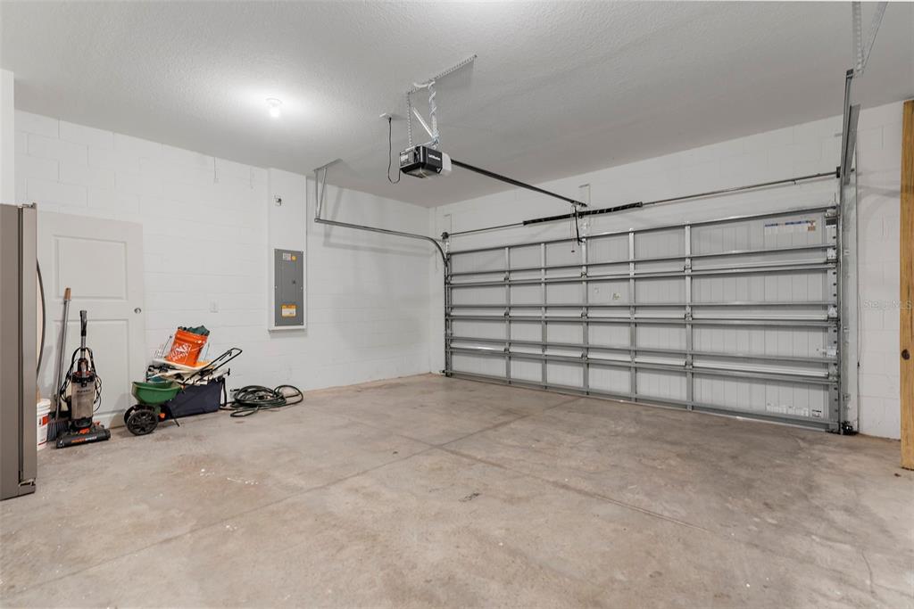 1038 Kelly Fern Loop Ruskin, FL 33570 - Photo 30 of 34 a view of a garage