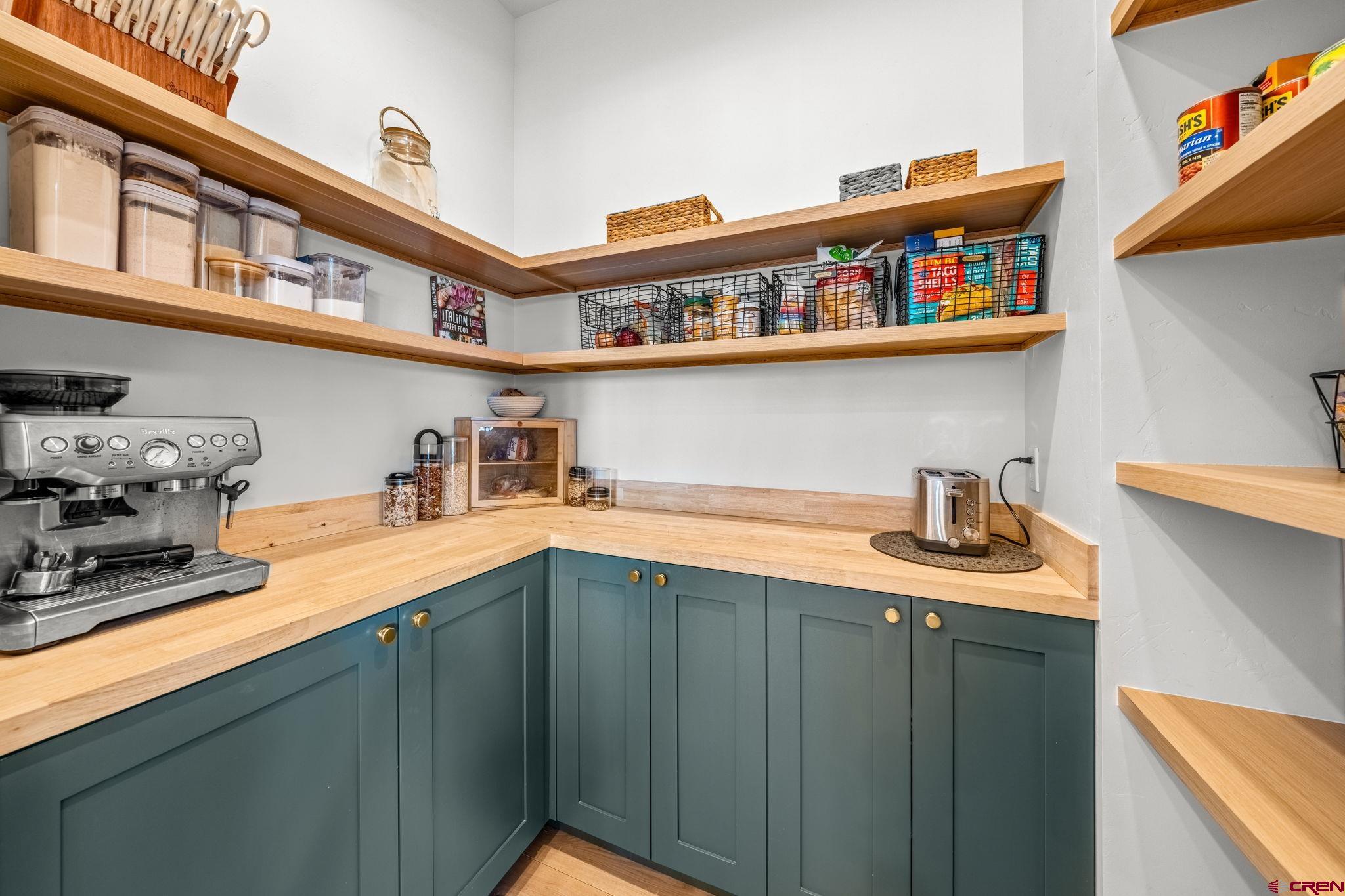 26 Boulder View Drive Durango, CO 81301 - Photo 23 of 45 a kitchen with stainless steel appliances granite countertop a sink and cabinets